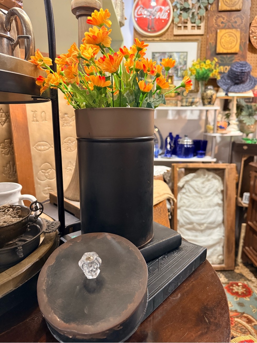 Black Metal Floral Canister Vase with Orange Flowers